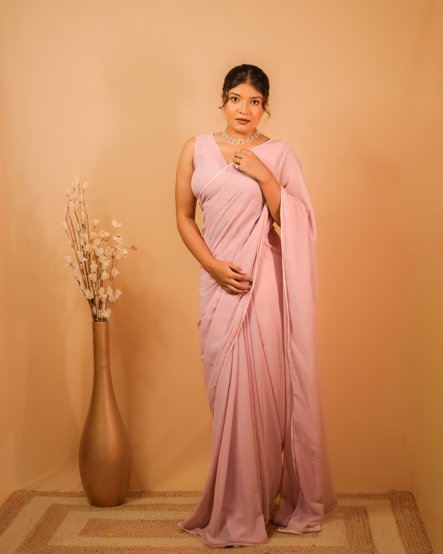 Nazakat: Pastel Pink Heavy Georgette Saree with White Piping