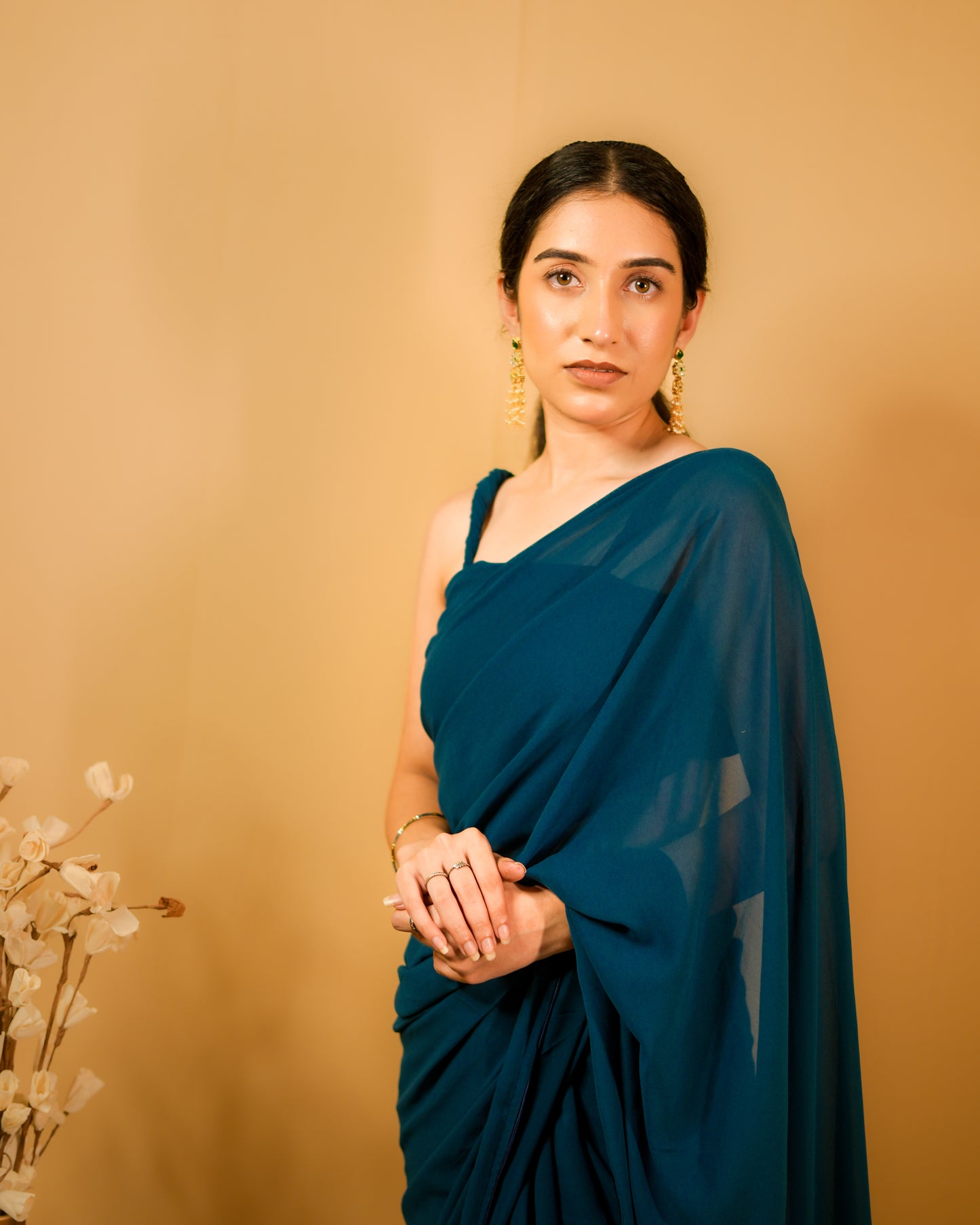 Neelkamal: Teal Blue Heavy Georgette Saree with Piping