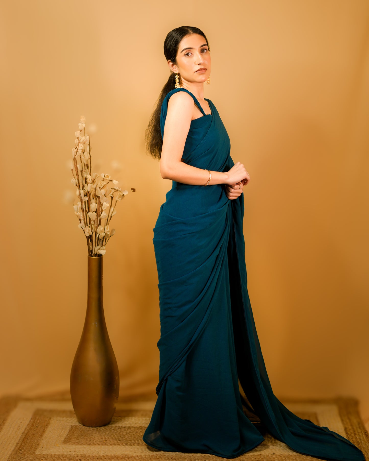 Neelkamal: Teal Blue Heavy Georgette Saree with Piping