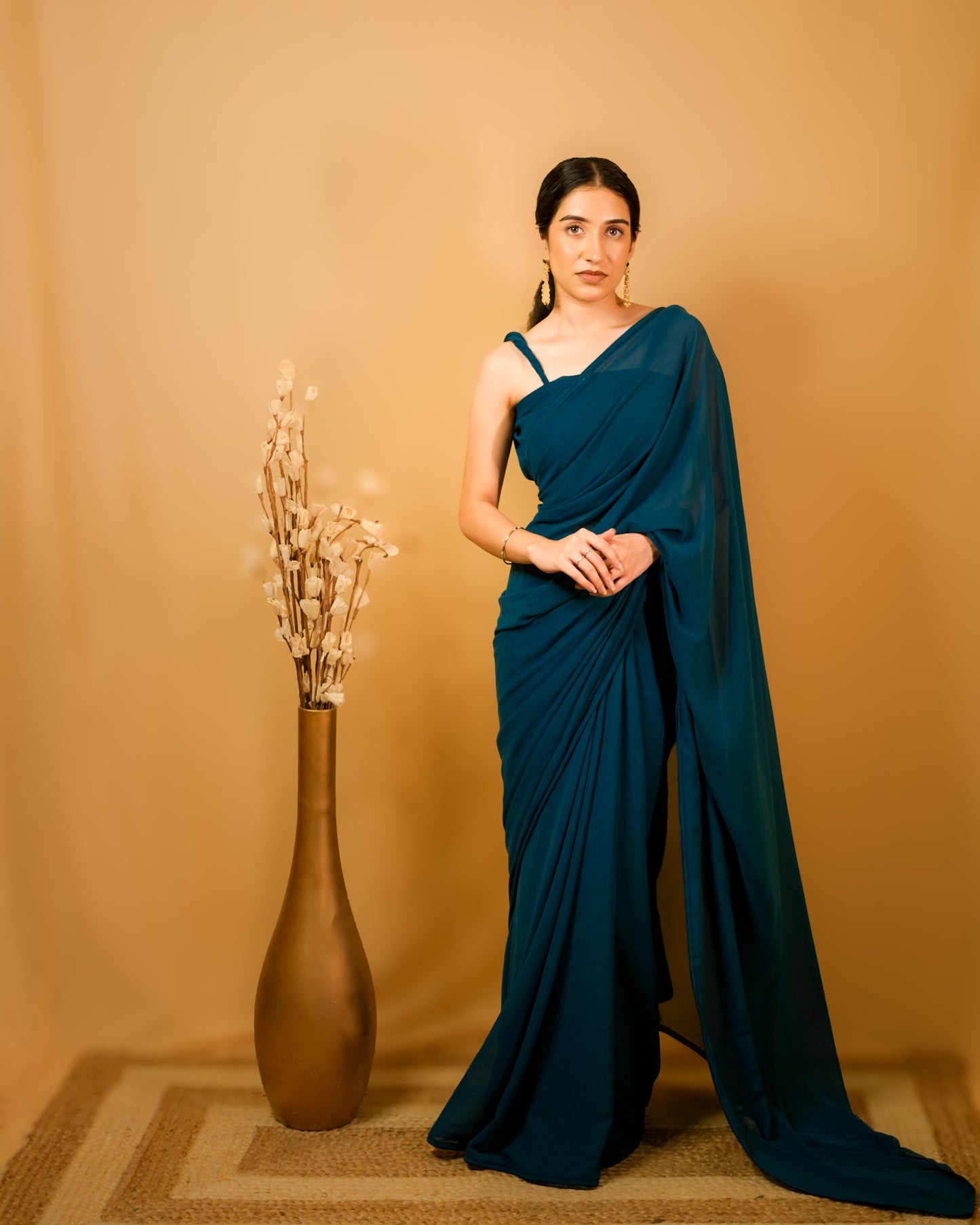 Neelkamal: Teal Blue Heavy Georgette Saree with Piping