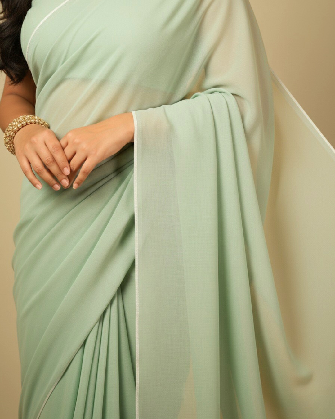 Mehek: Mint Green Heavy Georgette Saree with White Piping