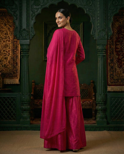 Rubaab: Deepest Pink Embroidered Sharara Set by Velltiska