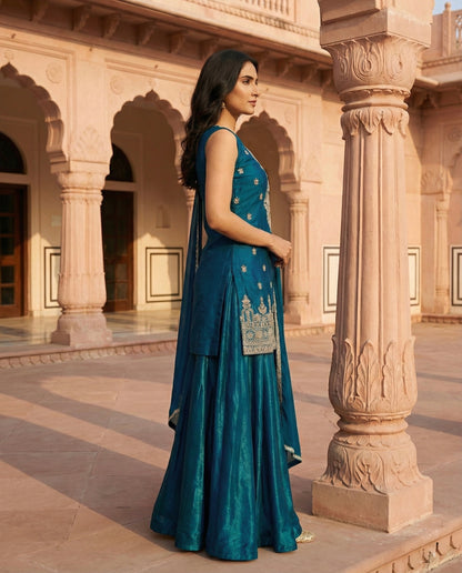 Fitoor: Teal Blue Embroidered Sharara Set by Velltiska