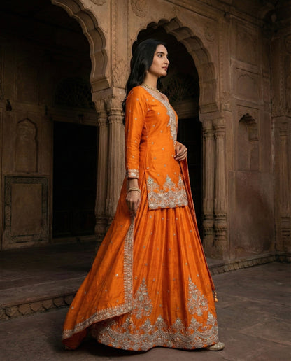 Hoor: Bright Orange Emboidered Kurta and Skirt Set by Velltiska