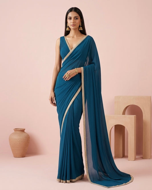 Tara: Teal Green Heavy Georgette Saree with Golden Lace