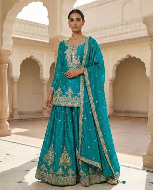 Zyrah: Vibrant Sky Blue Emboidered Kurta and Skirt Set by Velltiska