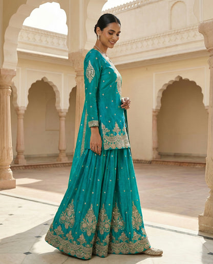 Zyrah: Vibrant Sky Blue Emboidered Kurta and Skirt Set by Velltiska