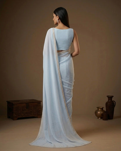 Lavanya: Pastel Blue Heavy Georgette Saree with Golden Lace
