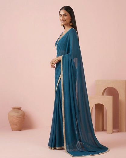 Tara: Teal Green Heavy Georgette Saree with Golden Lace