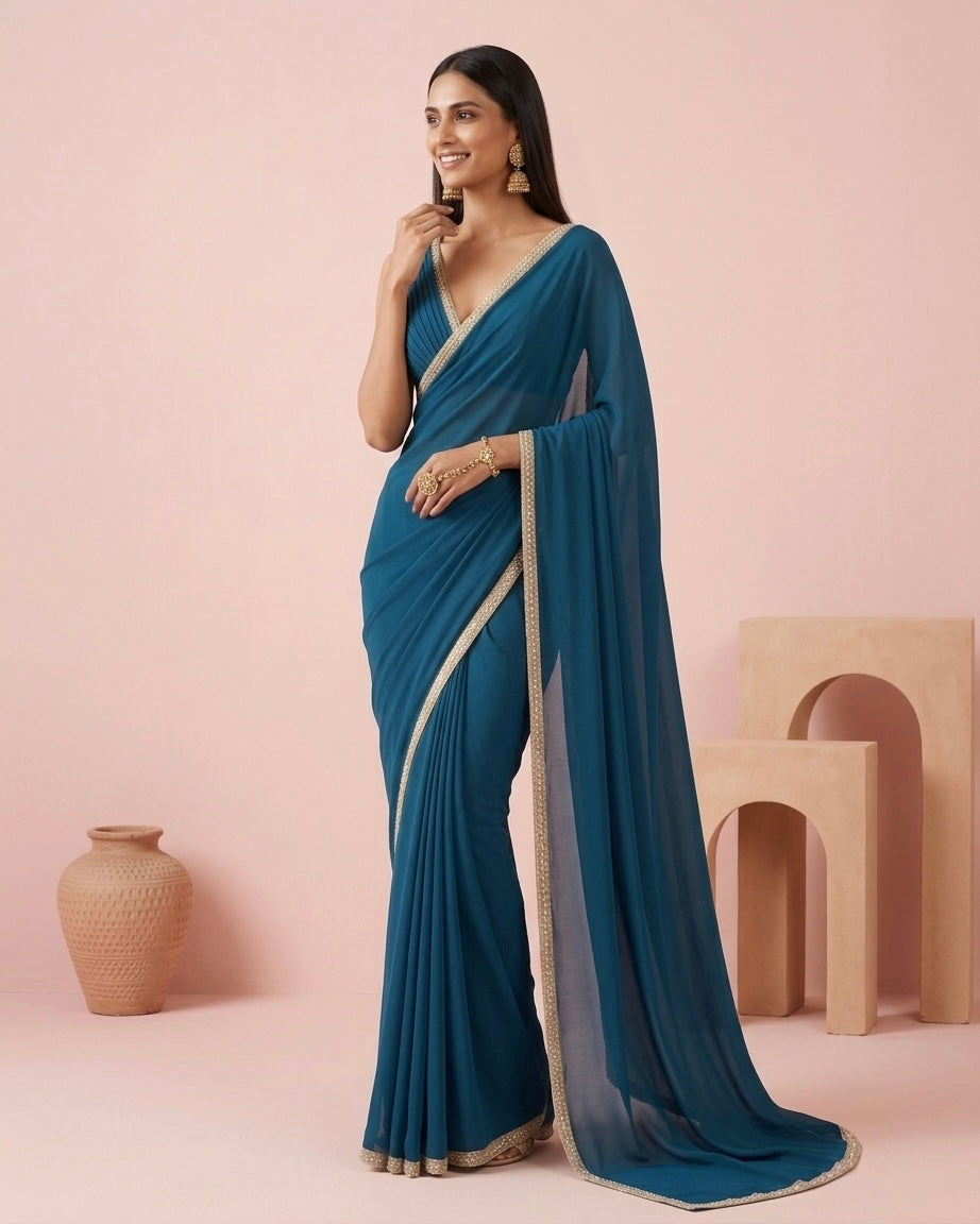 Tara: Teal Green Heavy Georgette Saree with Golden Lace