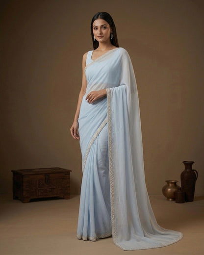 Lavanya: Pastel Blue Heavy Georgette Saree with Golden Lace