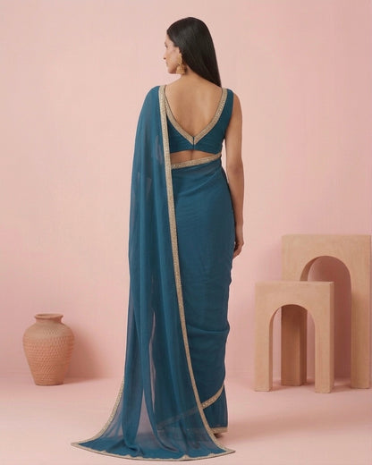 Tara: Teal Green Heavy Georgette Saree with Golden Lace