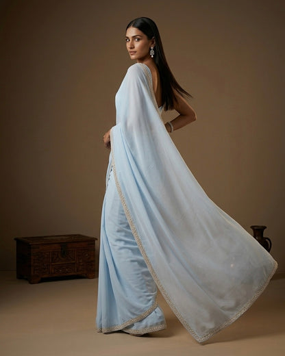 Lavanya: Pastel Blue Heavy Georgette Saree with Golden Lace