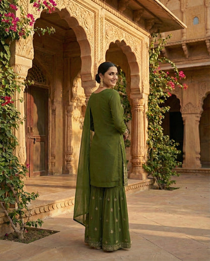 Maithili: Sea Green Embroidered Sharara Set by Velltiska