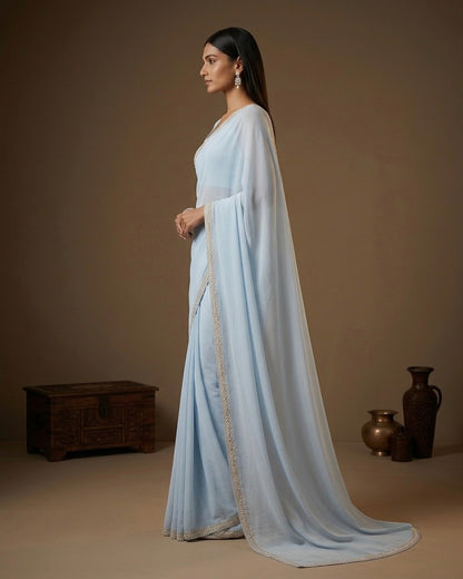 Lavanya: Pastel Blue Heavy Georgette Saree with Golden Lace