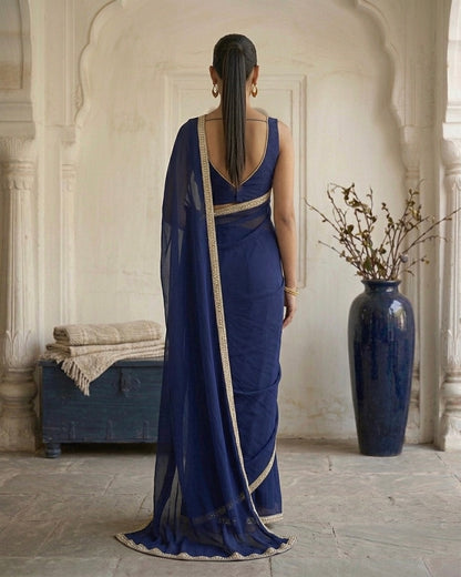 Zayra: Navy Blue Heavy Georgette Saree with Golden Lace