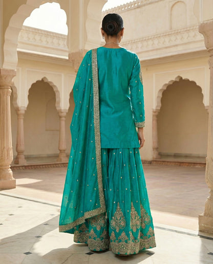 Zyrah: Vibrant Sky Blue Emboidered Kurta and Skirt Set by Velltiska
