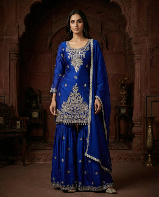 Dhara: Royal Blue Embroidered Sharara Set by Velltiska