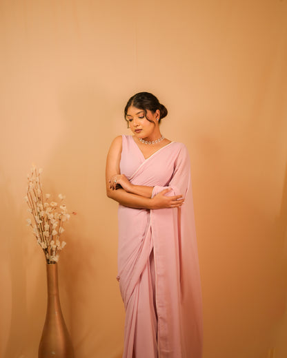 Nazakat: Pastel Pink Heavy Georgette Saree with White Piping