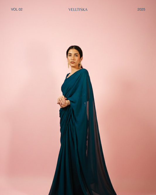 Neelkamal: Teal Blue Heavy Georgette Saree with Piping