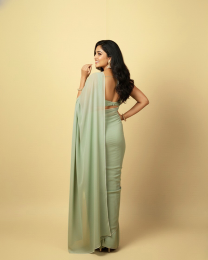 Mehek: Mint Green Heavy Georgette Saree with White Piping