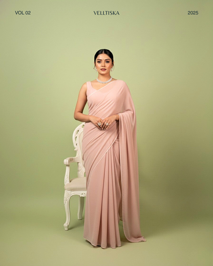 Nazakat: Pastel Pink Heavy Georgette Saree with White Piping