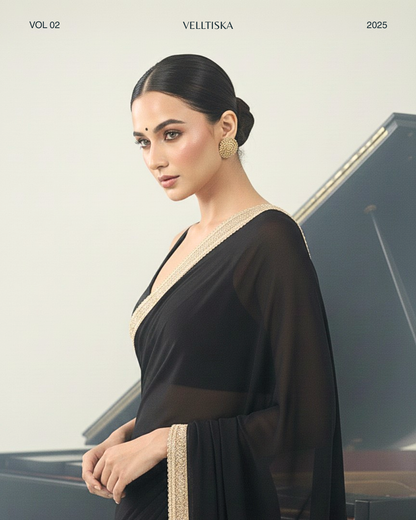 Zeenat: Noir Black Heavy Georgette Saree with Golden Lace