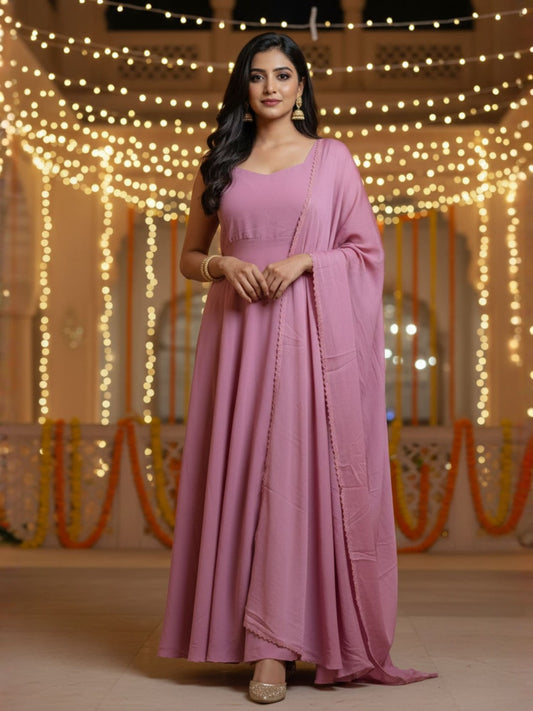 Nazm: Muted Pink Solid Anarkali Gown by Velltiska with Dupatta and Sleeves